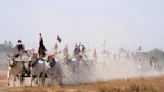 AP PHOTOS: Cambodian villagers hold rare oxcart race, seeking to revive a centuries-old tradition