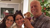 Bruce Willis cuddles dog in first family photos since retirement due to health