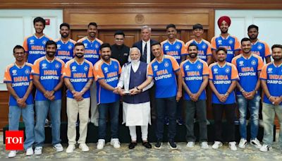 Team India celebrates T20 World Cup win with PM Modi, flaunting custom 'Champions' jerseys - Times of India