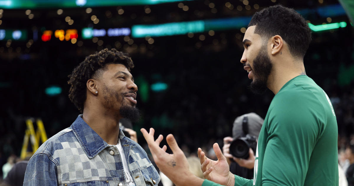 Marcus Smart congratulates Celtics on their championship, but adds it was "bittersweet" to watch from afar