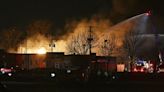 Industrial fire and multiple explosions shoot debris into the air in Detroit suburb