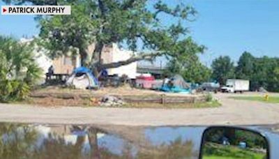 Former school campus becomes tent city as Mississippi neighborhood's homeless population reaches crisis point