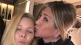 Jennifer Aniston plants a kiss on Friends co-star Lisa Kudrow as she wishes her a happy 60th birthday