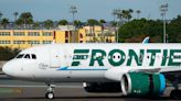 A Frontier passenger sat in an exit row was escorted off the plane in handcuffs after seemingly saying she wouldn't help in an emergency