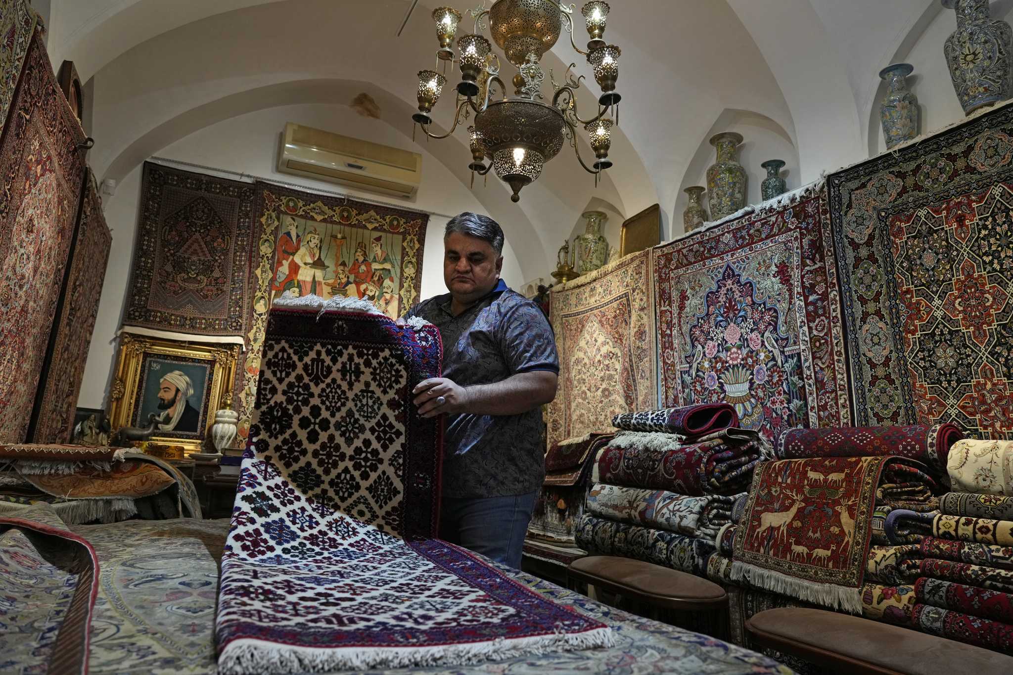 Sanctions and a hobbled economy pull the rug out from under Iran's traditional carpet weavers