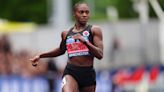 Dina Asher-Smith warms the crowd on a chilly day in Manchester