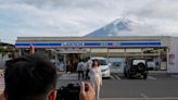 Japanese locals block view of Mount Fuji to deter tourists