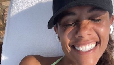 Alex Scott relaxes in a bikini with sleeping girlfriend Jess Glynne