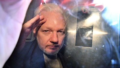 Julian Assange arrives at court on US-controlled island of Saipan