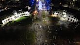 ‘Reckless’ youths aim fireworks and petrol bombs at riot police in Bonfire Night stand-off