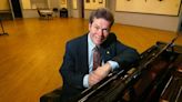 Belleville Philharmonic was already in major transition. Now its director has died.