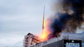 Iconic spire of Copenhagen’s former stock exchange collapses in huge inferno