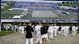 Defense secretary tells US Naval Academy graduates they will lead 'through tension and uncertainty'