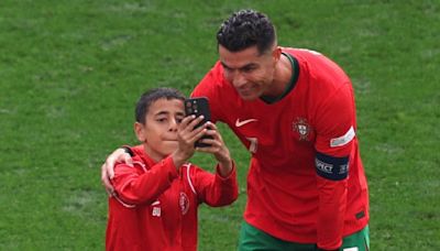 Cristiano Ronaldo poses for selfie with Euro 2024 pitch invader