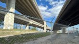 Why there’s new barbed wire fencing below south Austin highway