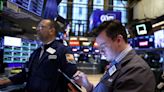 Dow, S&P 500 edge higher after inflation rises as expected