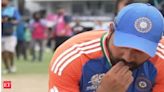 Watch as Rohit Sharma explains why he ate soil from Barbados pitch after winning T20 World Cup - The Economic Times