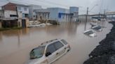 Brazil’s flooded south sees first death from disease, as experts warn of coming surge in fatalities