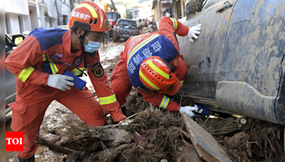 Historic flooding in southern China kills 47, with more floods feared in coming days - Times of India