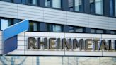 Tank maker Rheinmetall raises sales view, asks Berlin for firm orders