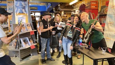 Def Leppard fans line up at Salzer's Records to see guitarist Phil Collen play and sign autographs