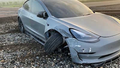 A Tesla owner says his car’s ‘self-driving’ technology failed to detect a moving train ahead of a crash caught on camera