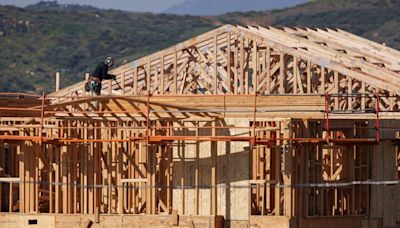 US single-family housing starts hit eight-month low; green shoots in manufacturing