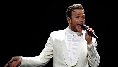 Olly Murs confesses ‘guilt’ as his wife looks after newborn daughter while he’s on tour