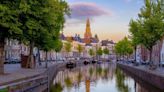 Skip the tourist traps and high prices in Amsterdam — take a short train ride to this beautiful gem instead