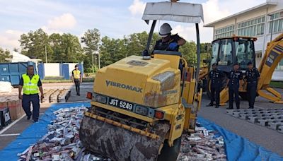 Johor police scrap confiscated illicit items worth more than RM420,000, solid waste to be recycled for sale