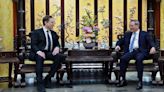 Elon Musk wins official praise for Tesla during surprise visit to China