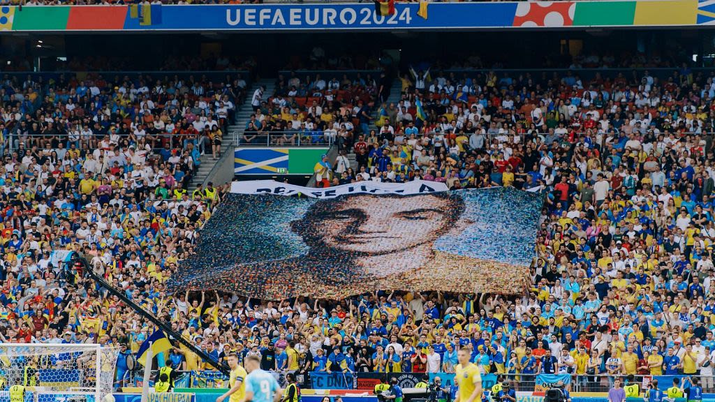 'Peace has a price': Football fans display mosaic of fallen Ukrainian soldiers at Euro 2024 match