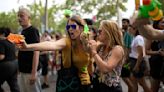 Barcelona anti-tourism protesters fire water pistols at visitors