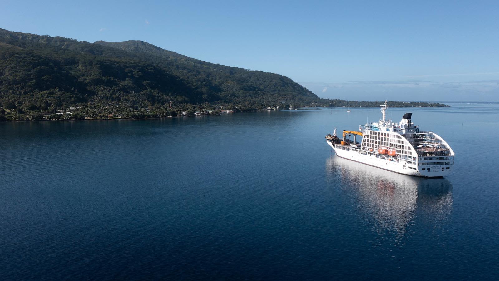 Surfers enjoy 1st-ever floating Olympic village, staying in suites at sea in French Polynesia