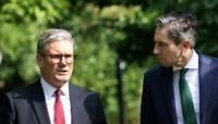 Irish Prime Minister Simon Simon Harris (R) welcomed UK counterpart Keir Starmer (L) to Dublin, with the pair shaking hands and posing for photographs before heading for talks