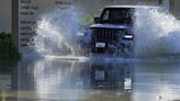 Storm dumps heaviest rain ever recorded in desert nation of UAE, flooding roads and Dubai’s airport