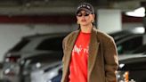 Hailey Bieber Bares Her Baby Bump in a Red Rugby Sweater