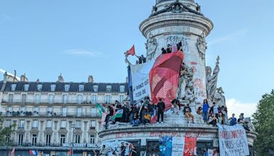 France's left-wing alliance blocks a far-right majority, projection shows