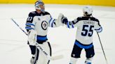 Jets sign stars Connor Hellebuyck and Mark Scheifele to matching 7-year extensions