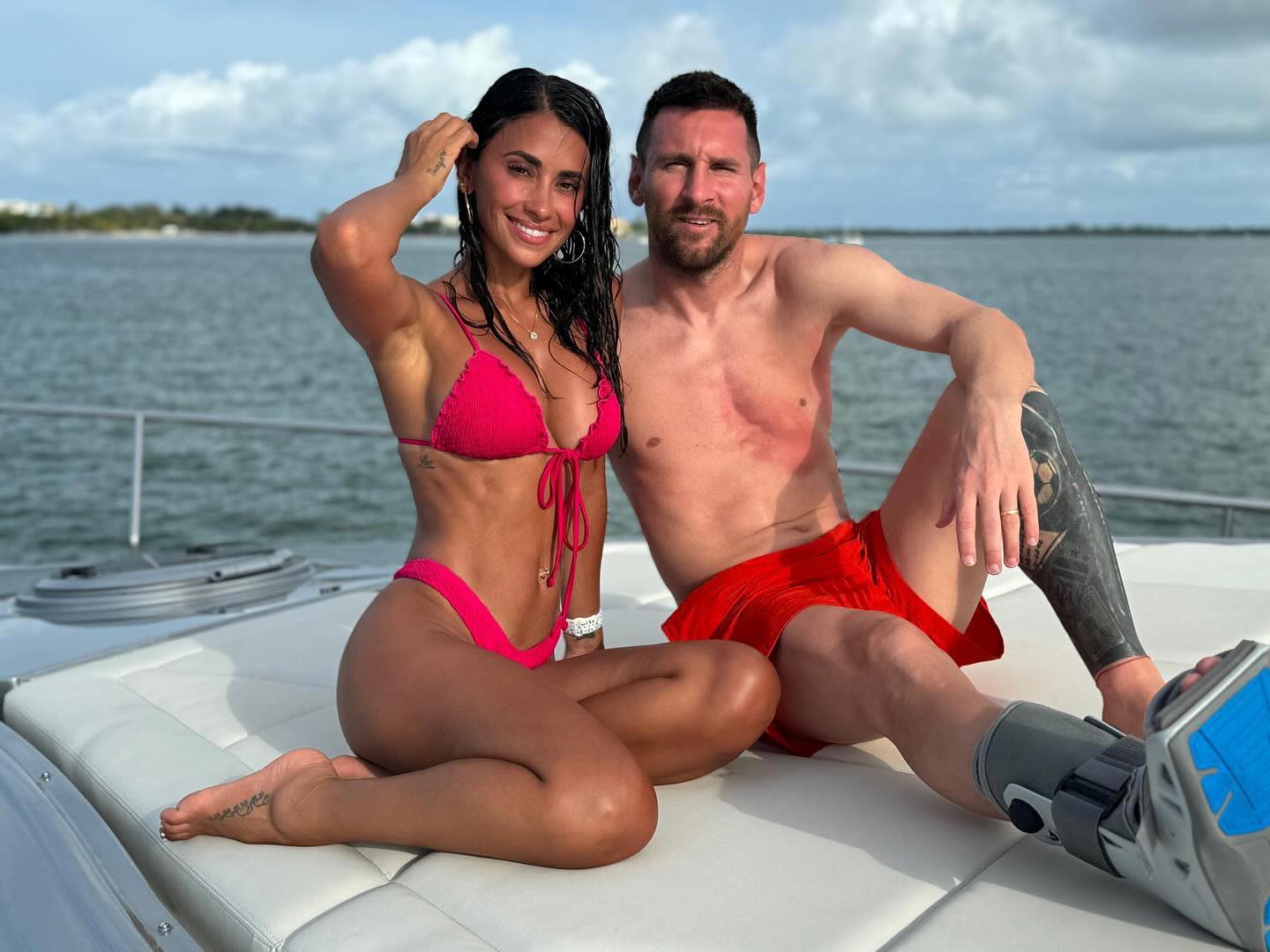 Lionel Messi Poses Shirtless in Walking Boot on Boat Alongside Bikini-Clad Wife Antonela Roccuzzo