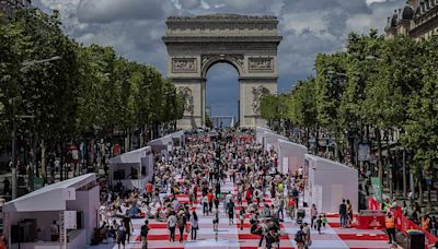 Paris' famous Champs-Élysées transformed into a massive free picnic with treats from famous chefs