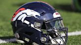 Broncos OT Bailey leaves practice in air cast