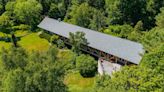 This Gorgeous $17.5 Million Vermont Home Doubles as a Bridge That Sits Over a Babbling River