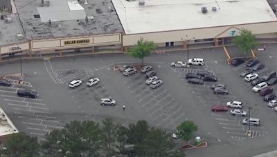 Alleged robbery suspect critically injured after shooting with authorities at DeKalb County shopping center, police say