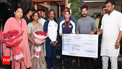 Deepthi Jeevanji Receives Rs 1 Crore Cheque from Telangana CM Revanth Reddy for Paralympic Bronze | Hyderabad News - Times of India