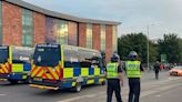 Protest in Manchester erupts into scenes of violence as man dragged off bus and rocks and bottles pelted at police