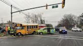 Minivan and school bus collide in Manchester, sending four people to local hospitals