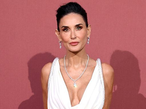 Demi Moore Takes the Plunge in Elegant White Gown (with Thigh-High Slit!) as the Host of 2024 amfAR Gala at Cannes