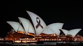Sydney Opera House illuminated with black ribbon for shopping centre stabbing victims