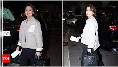 Pics: Neetu Kapoor arrives at the airport in style | Hindi Movie News - Times of India